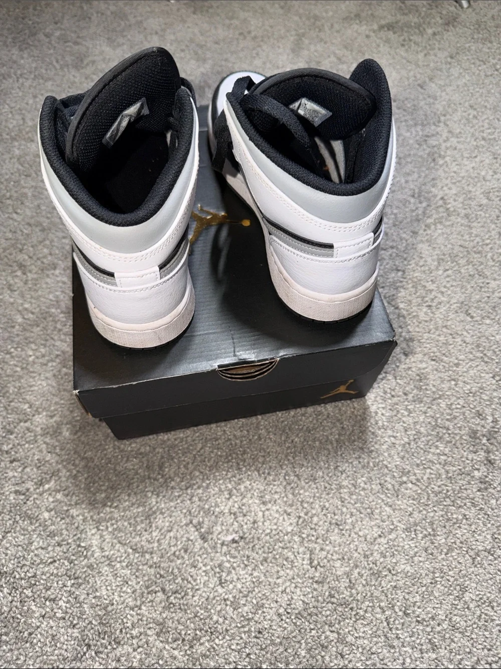 Jordan Kids Black and White High-Top Sneakers